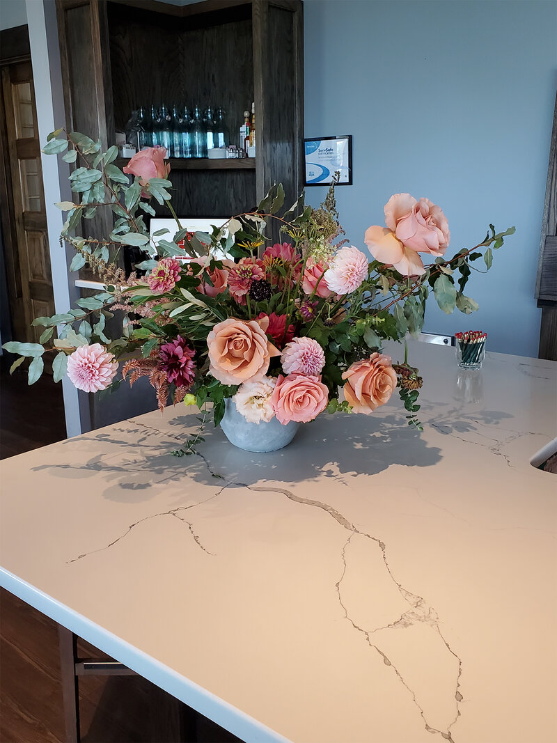 Flowers on top of bar counter