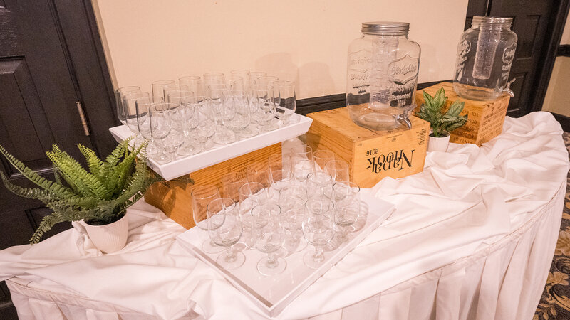 Water jug and glasses on table