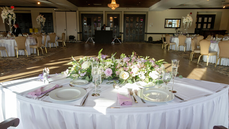 Table set for two with flower arrangement